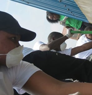 Sarova Staff help clean up Mathare